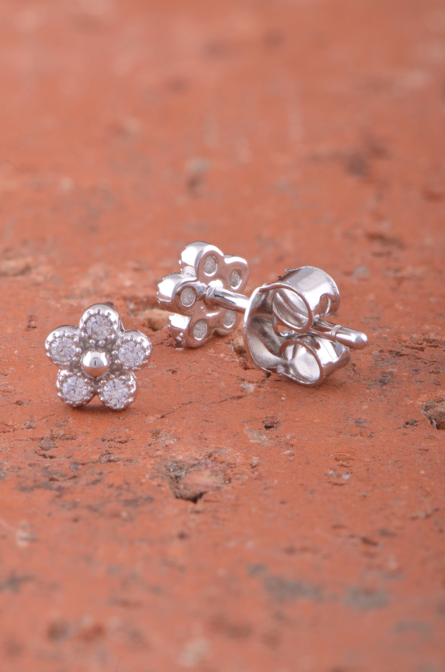 White Gold Over Sterling Silver Womens Tiny Flower Cz Stud Earrings