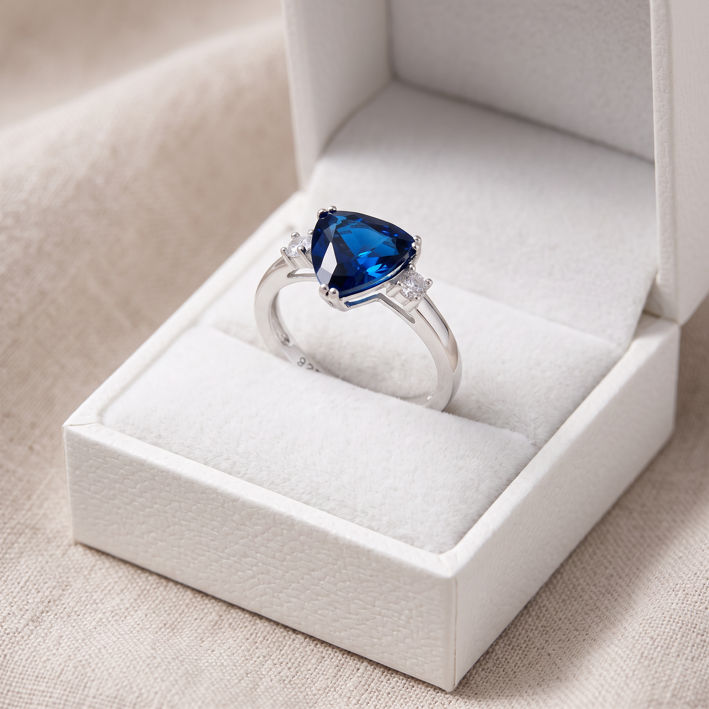 Sterling Silver Trillion Cut Blue Spinel CZ Ring in a white gift box, trillion cut blue spinel cz gift for her