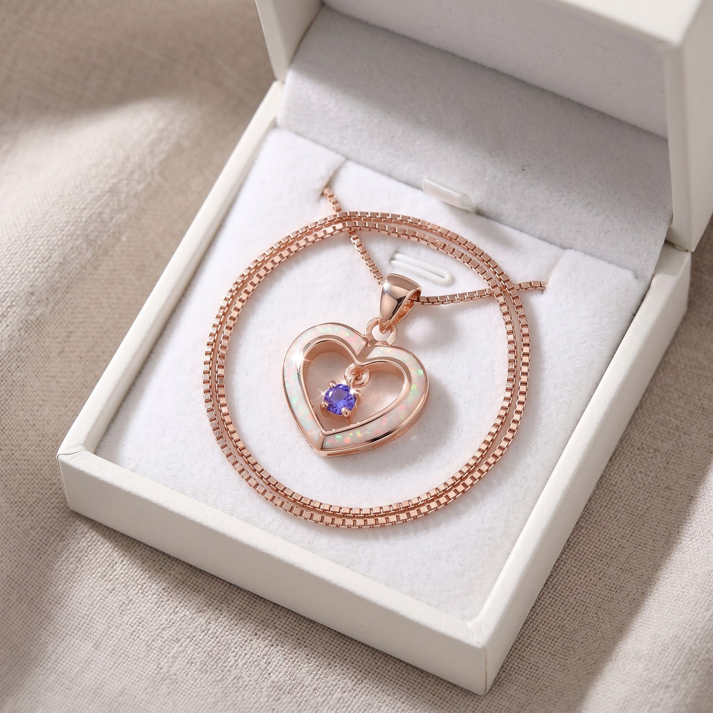 Rose Gold over Sterling Silver Women's Dainty Created Pink Opal Heart Charm Necklace in a white gift box, ready to give