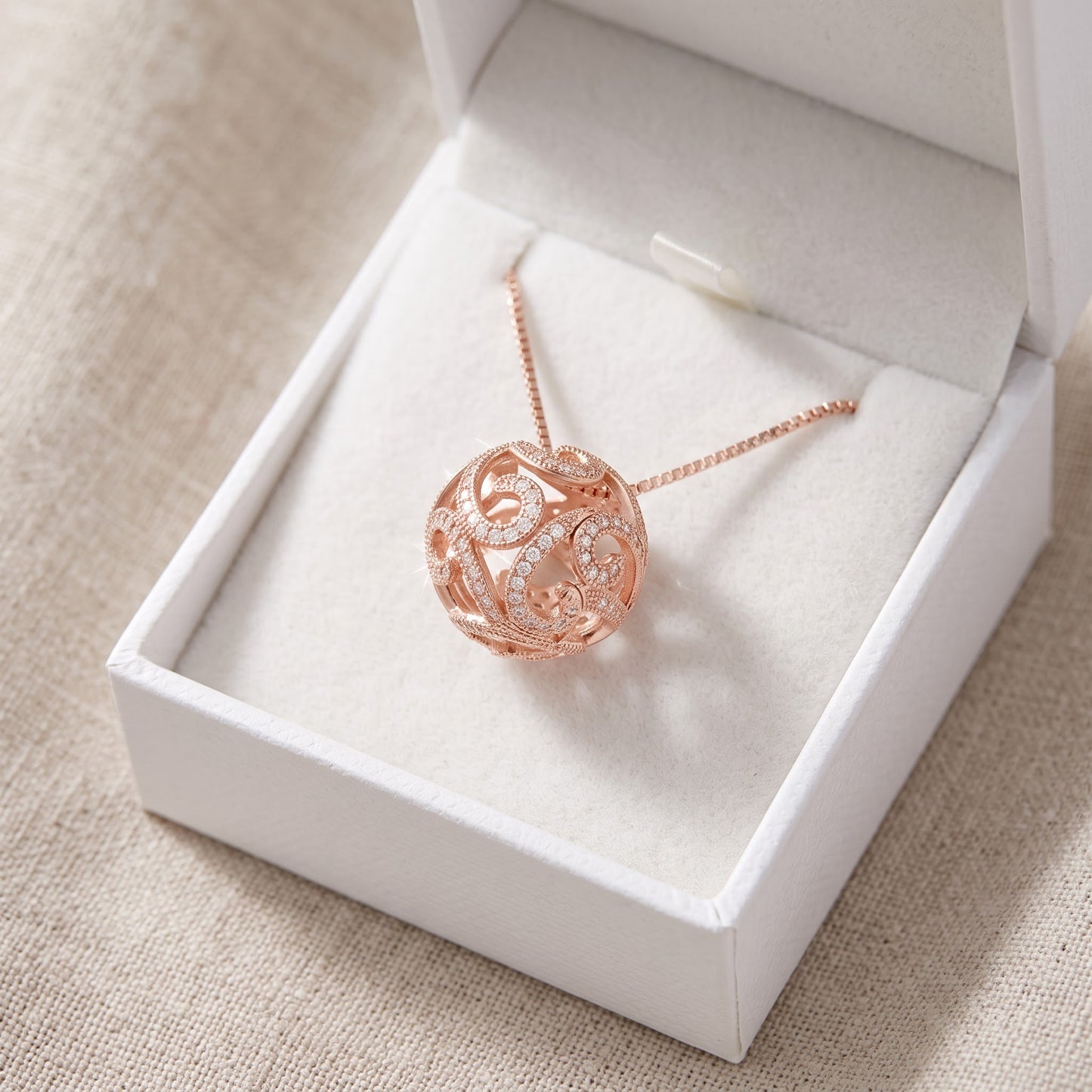 Rose Gold Tone Sterling Silver CZ Filigree Ball Necklace 18" in a white gift box, ready to give
