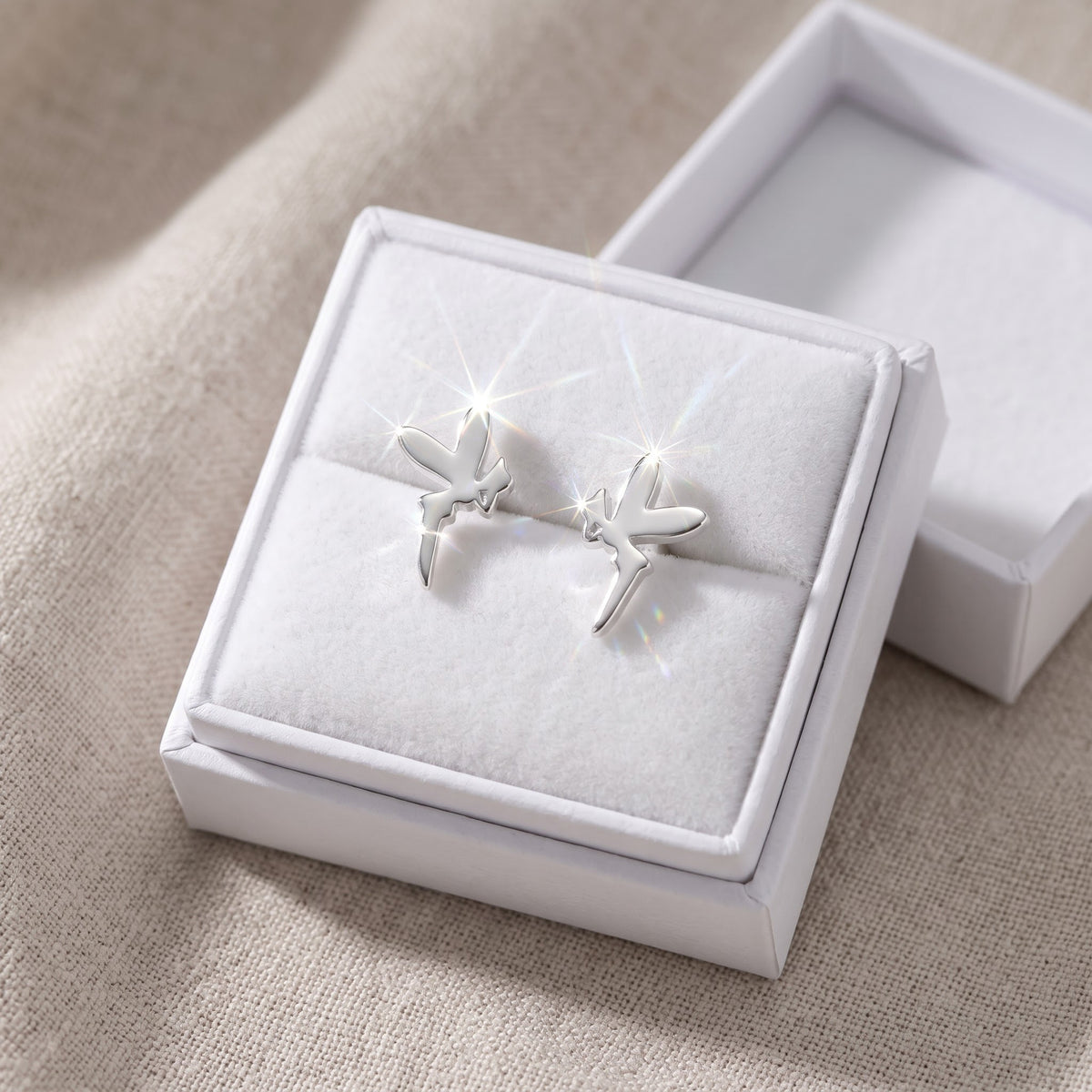 Sterling Silver Small Pixie Fairy Women's stud Earrings Girls Sprite Fairy Studs in a white gift box, ready to give