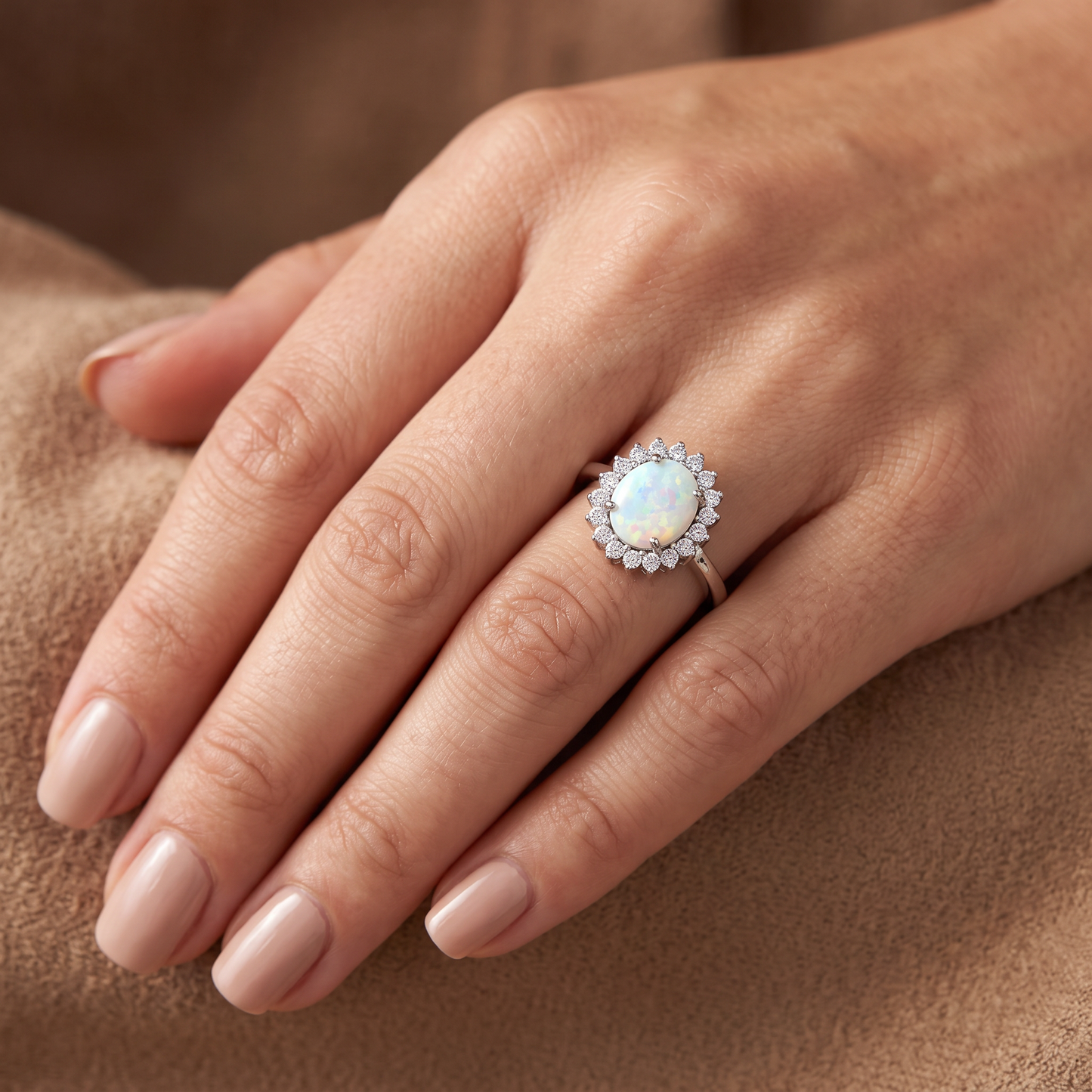 Sterling Silver Oval White Lab Opal CZ Ring worn on hand