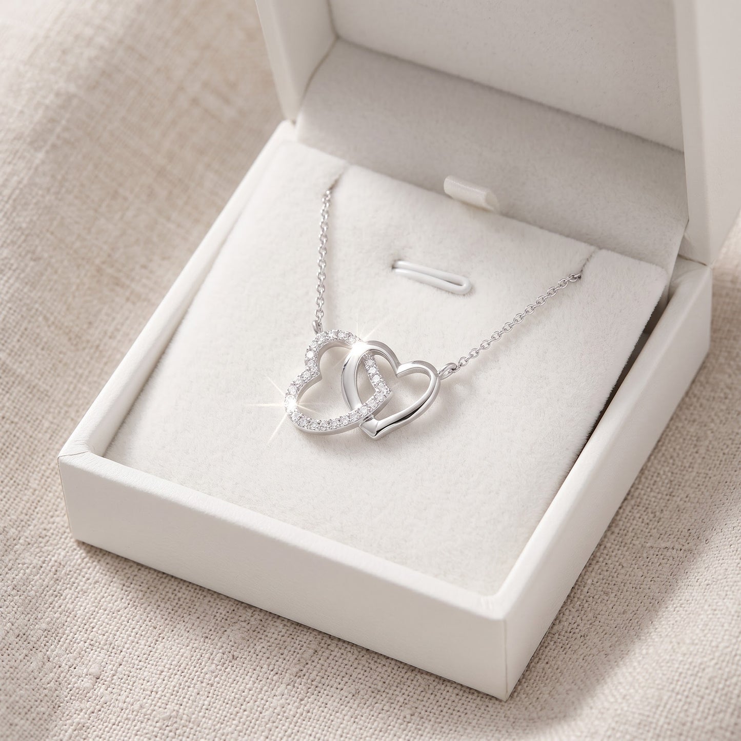 Sterling Silver CZ Interlocking Hearts Necklace, 18" in a white gift box, ready to give