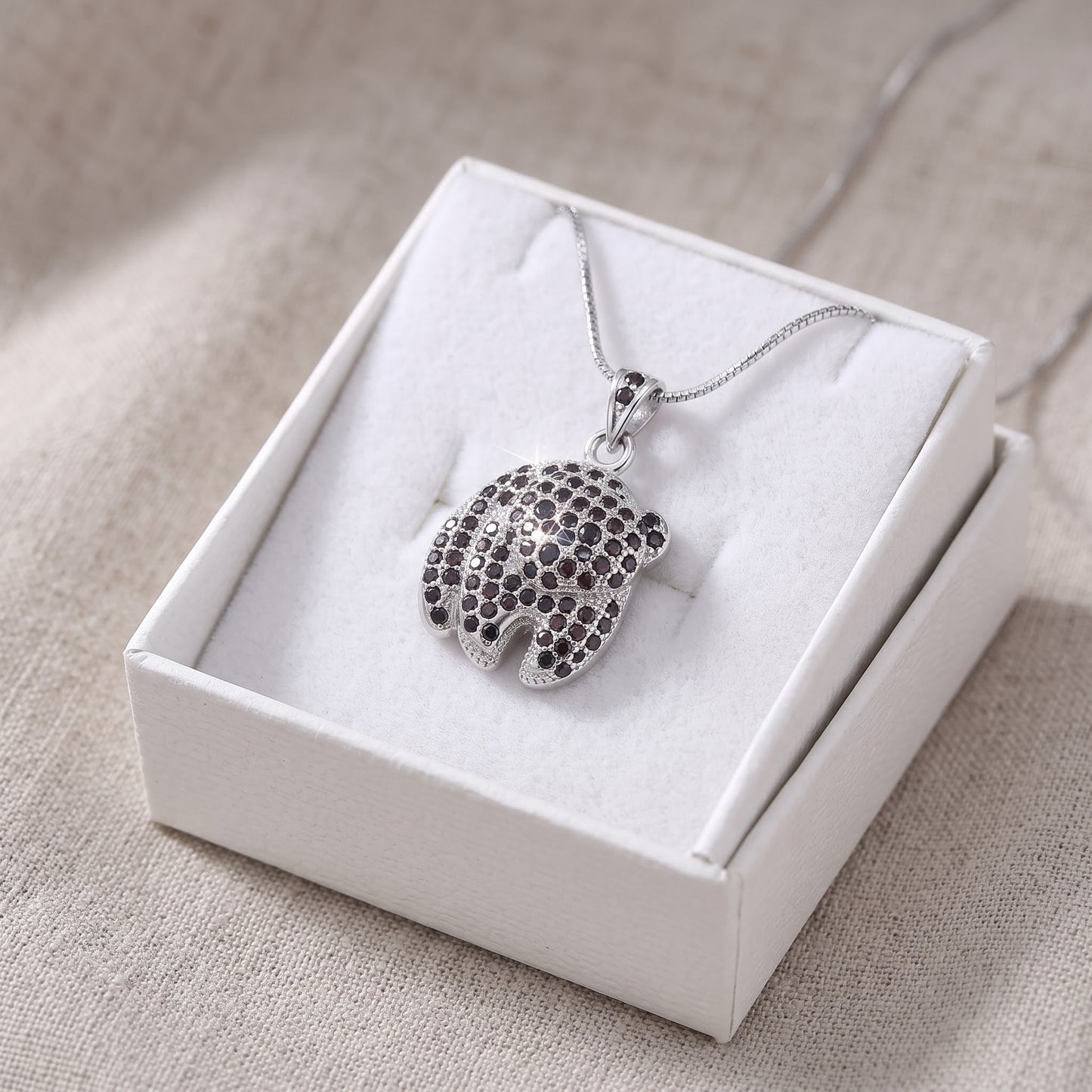 Sterling Silver CZ Panda Bear Necklace in a white gift box, ready to give