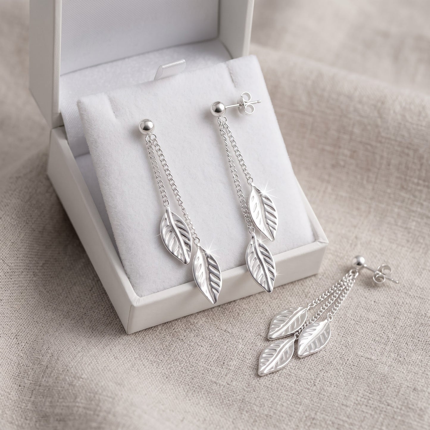 Sterling Silver Women's Dangle Chain Leaf Push Back Drop Earrings in a white gift box, ready to give