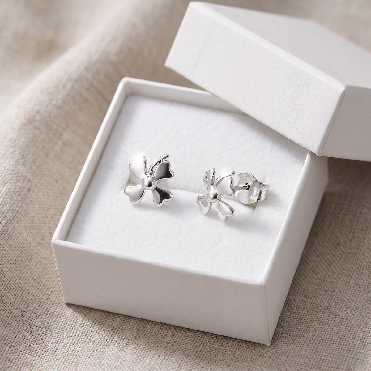 Sterling Silver Four Leaf Clover Stud Earrings - 8mm in a white gift box, ready to give