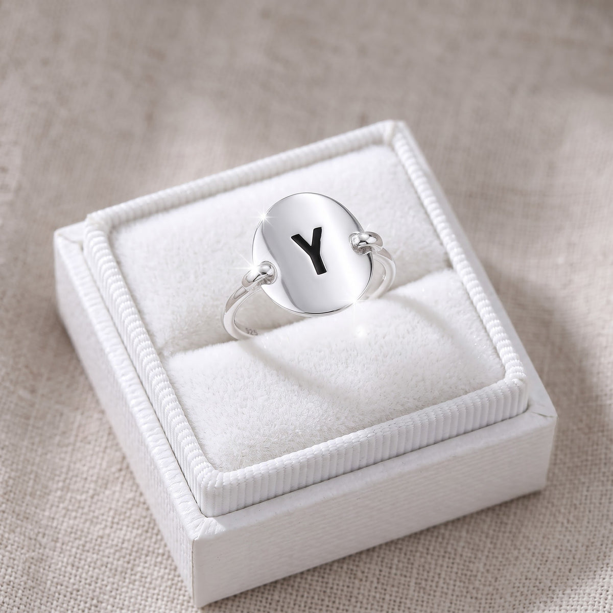 Sterling Silver Oval Initial Y Ring in a white gift box, ready to give