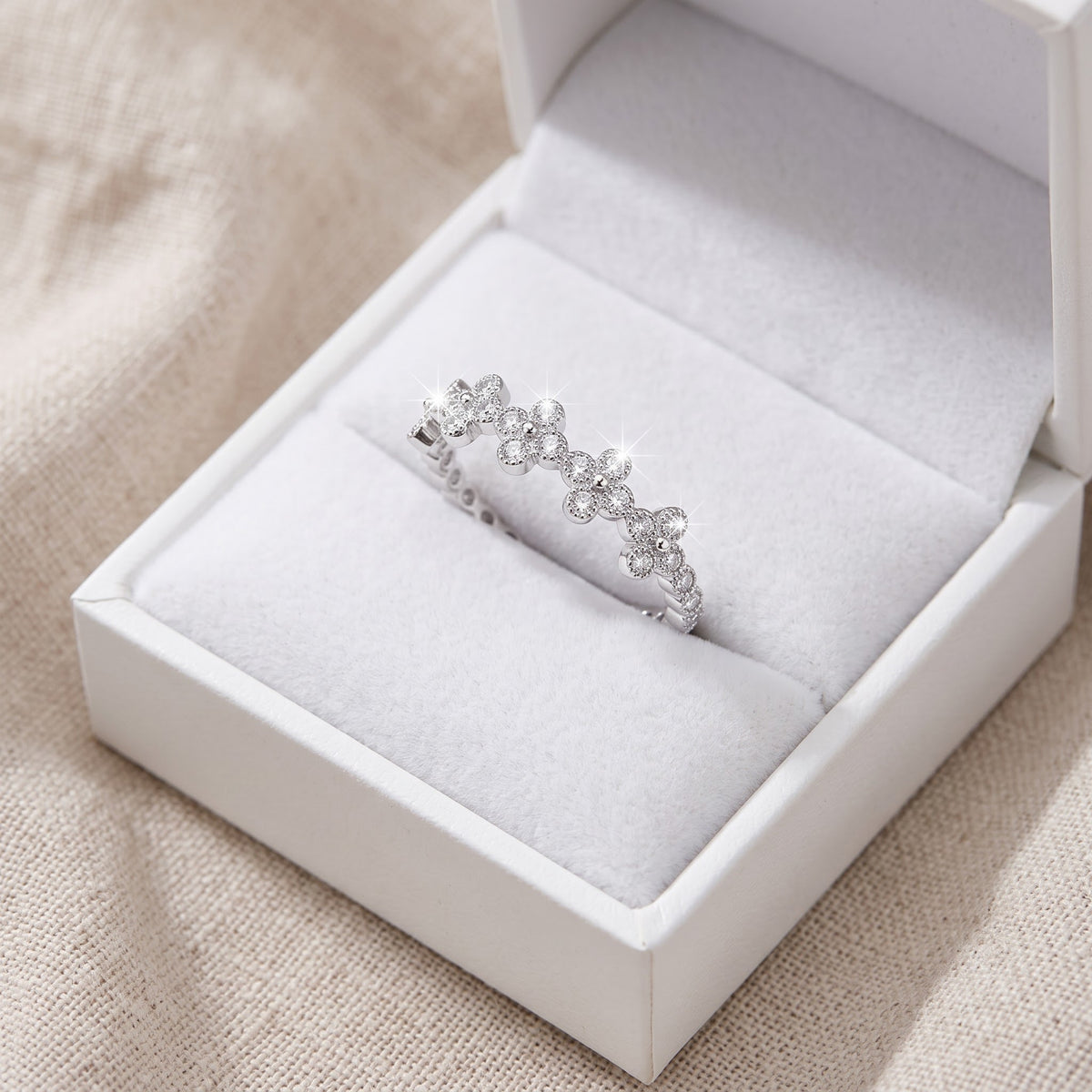 Sterling Silver Simulated Diamond Thin Cross Ring in a white gift box, ready to give