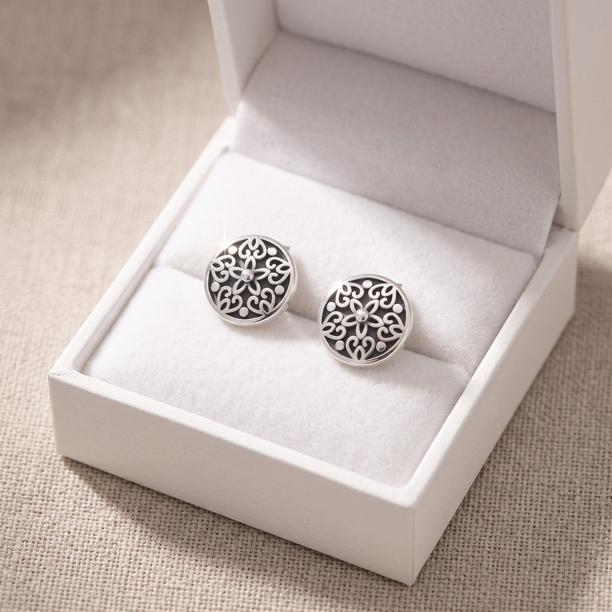 Sterling Silver Women's dainty Bali Filigree Flower Hearts Stud Earrings in a white gift box, ready to give
