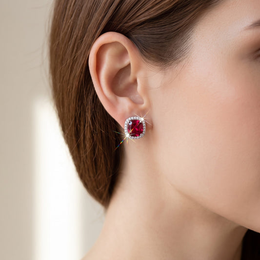 White Gold over Sterling Silver Cushion Cut Simulated Ruby CZ Halo stud earrings worn, lifestyle photo