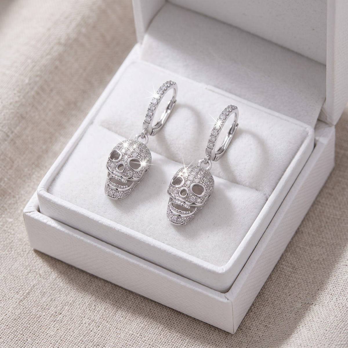 White Gold over Sterling Silver Women's Sugar Skull CZ Dangle Earrings in a white gift box, ready to give