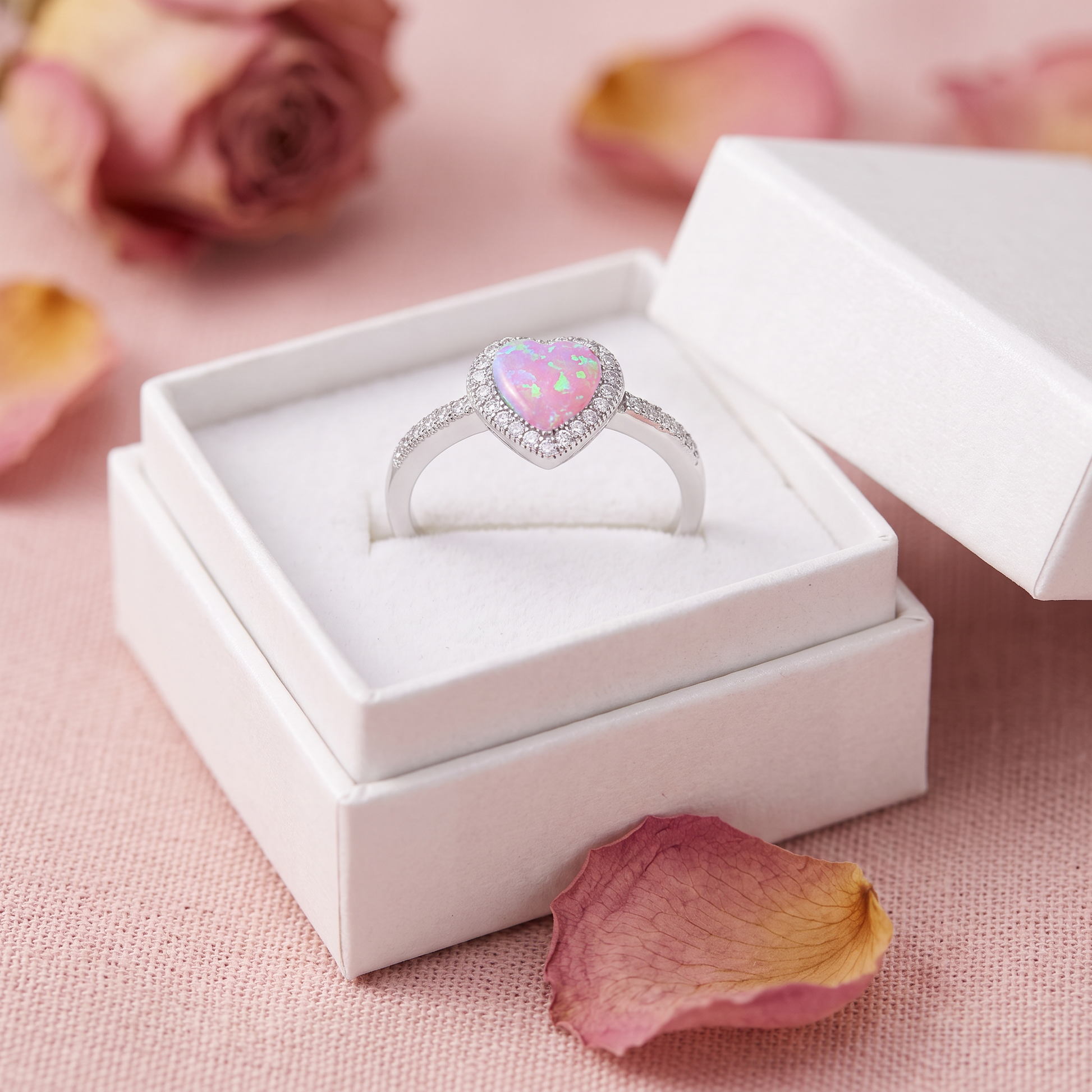 Sterling silver pink opal heart ring in a white gift box with rose petals, Valentine gift