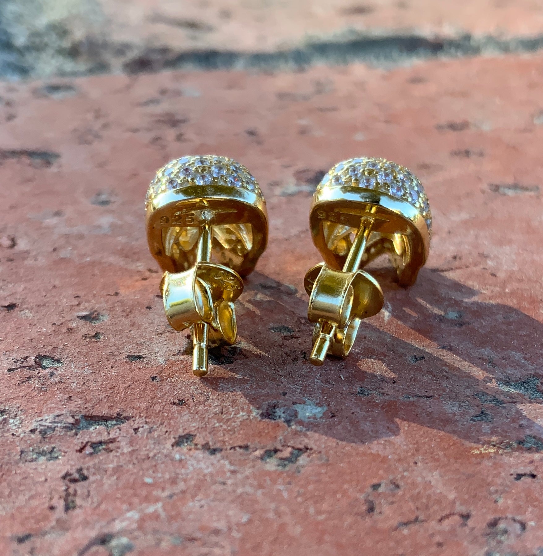 Yellow Gold Yellow Gold Over Sterling Silver Women's CZ Sugar Skull Stud Earrings 11mm — scale reference