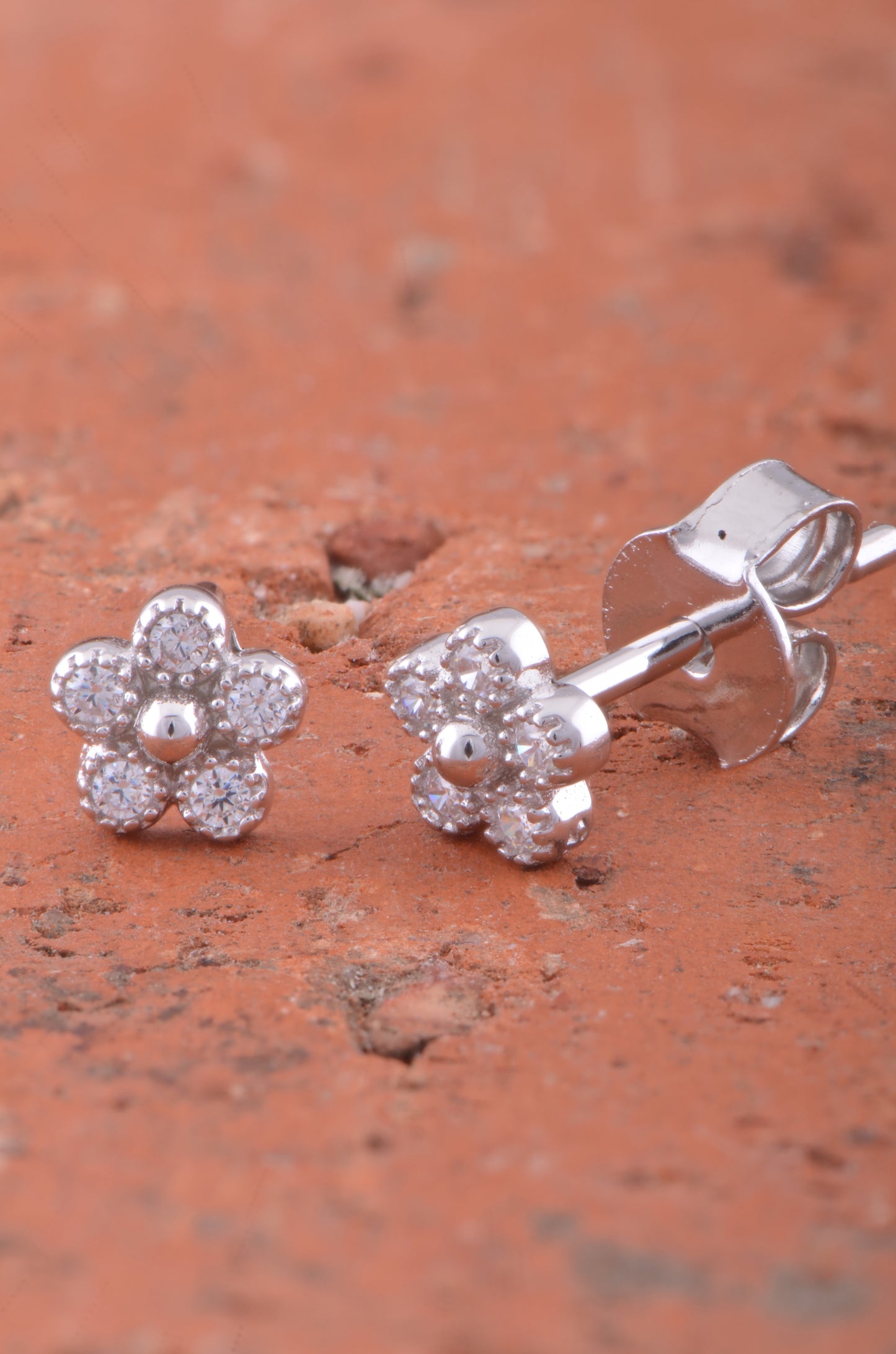 White Gold Over Sterling Silver Womens Tiny Flower Cz Stud Earrings