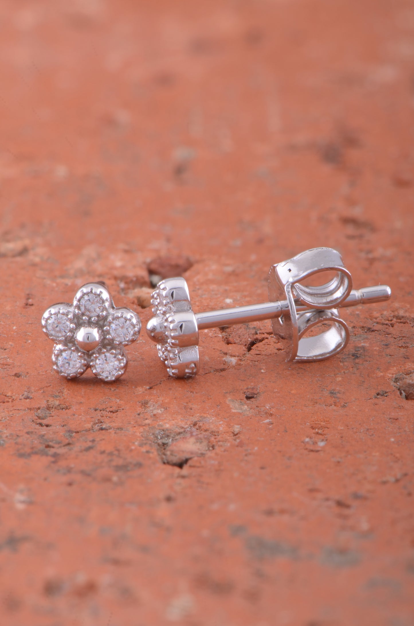 White Gold Over Sterling Silver Womens Tiny Flower Cz Stud Earrings