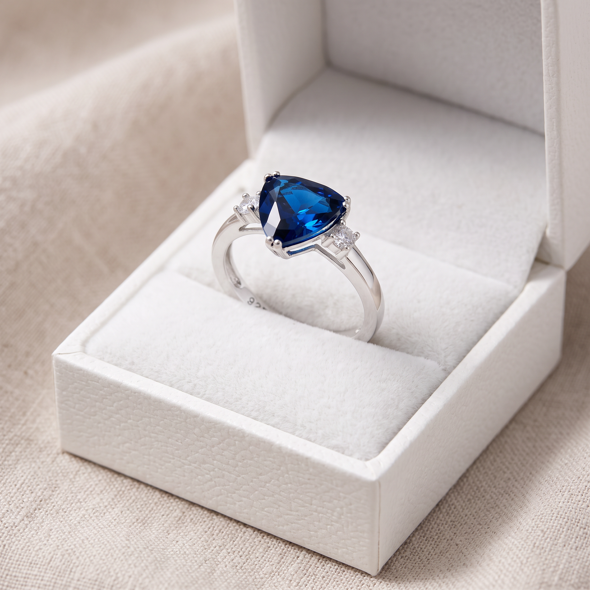Sterling Silver Trillion Cut Blue Spinel CZ Ring in a white gift box, trillion cut blue spinel cz gift for her