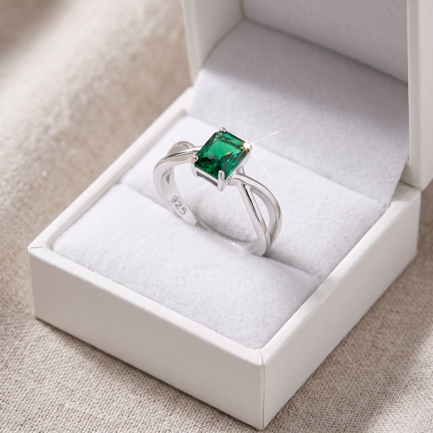 Sterling Silver Twist Emerald Cut Emerald CZ Ring in a white gift box, twist emerald cut emerald cz gift for her