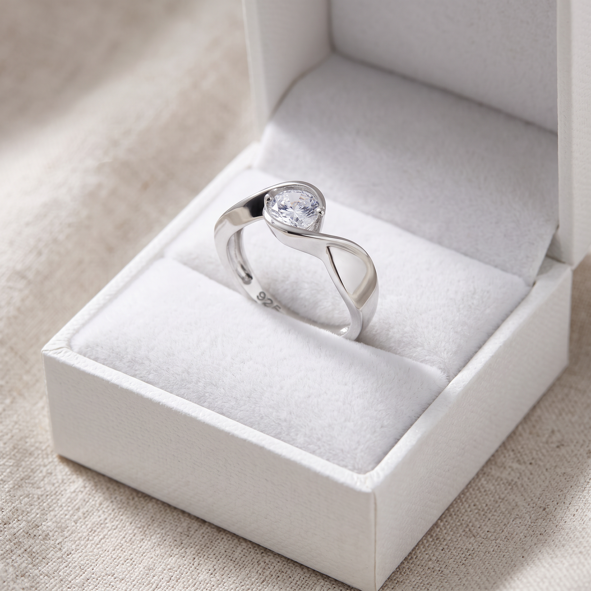 Sterling Silver Twisted Round Clear CZ Ring in a white gift box, twisted round clear cz gift for her