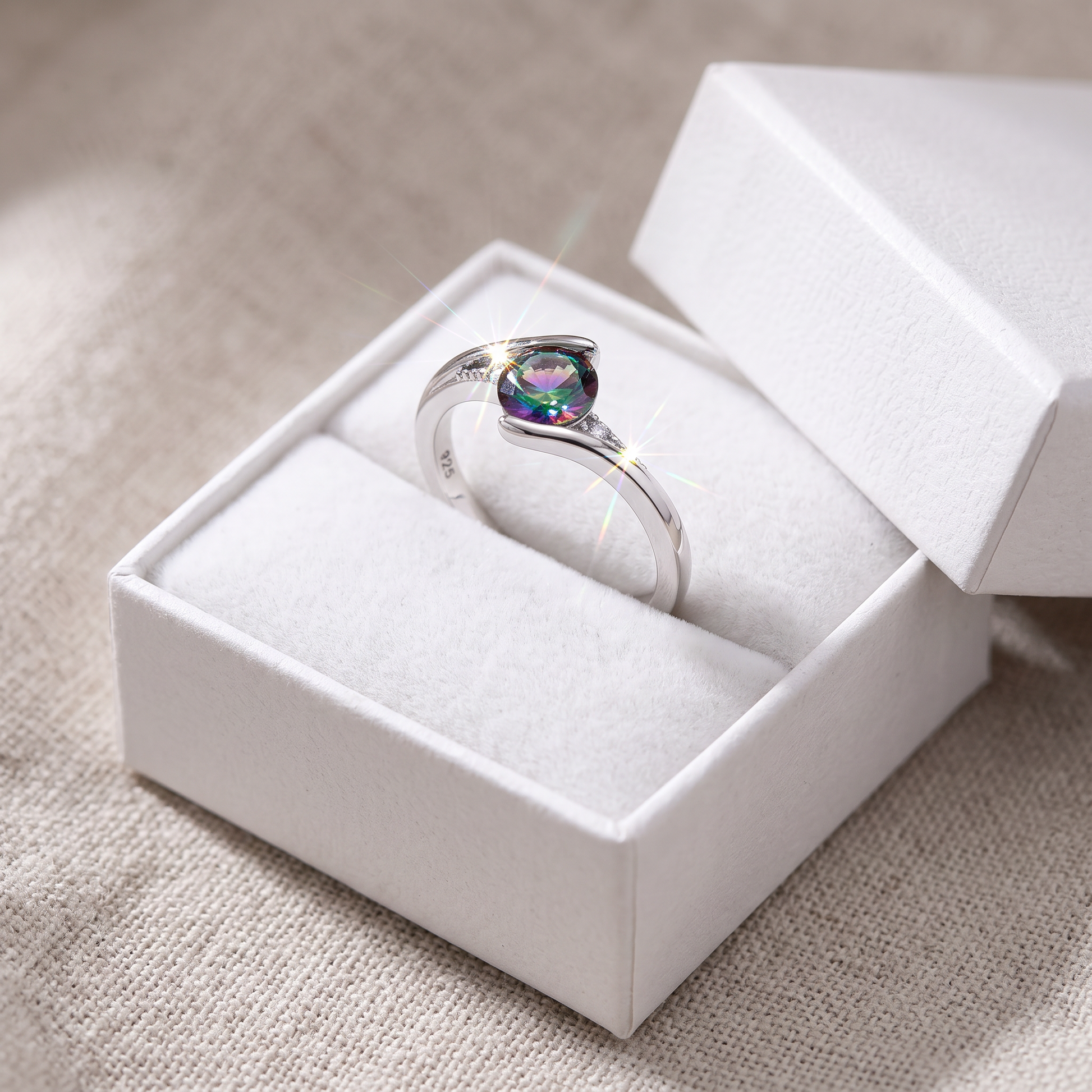 Sterling Silver Stuck In Between Rainbow CZ Ring in a white gift box, stuck in between rainbow cz gift for her