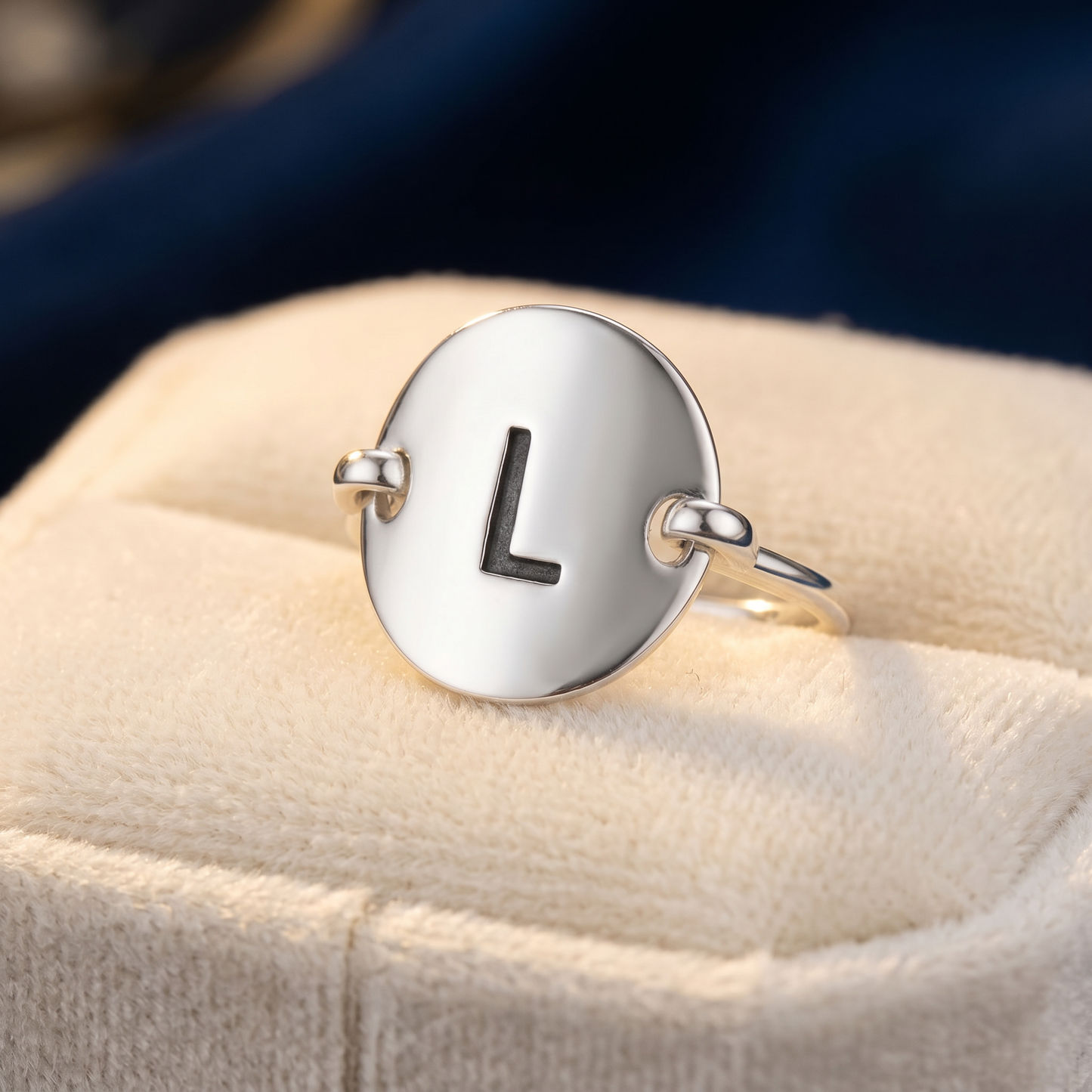 Sterling Silver Oval Initial L Ring on velvet