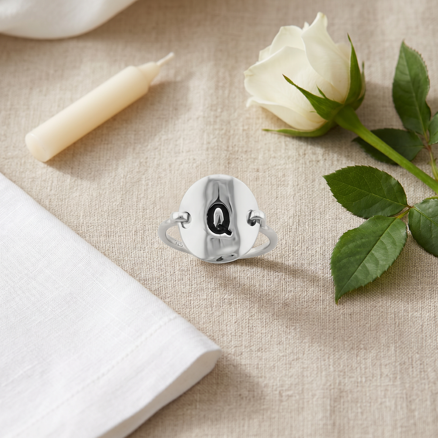 Sterling Silver Oval Initial Q Ring flat-lay