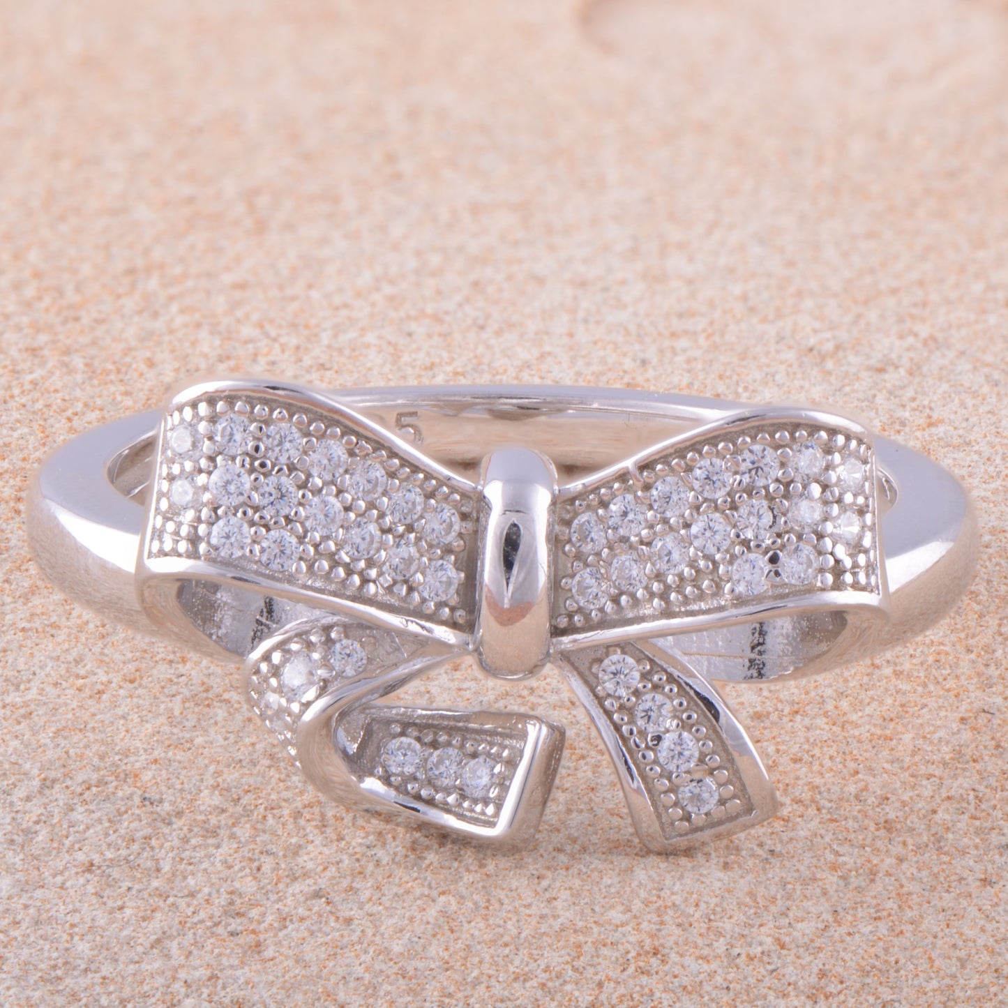 White Gold Over Sterling Silver Womens Cz Gift Bow Ring