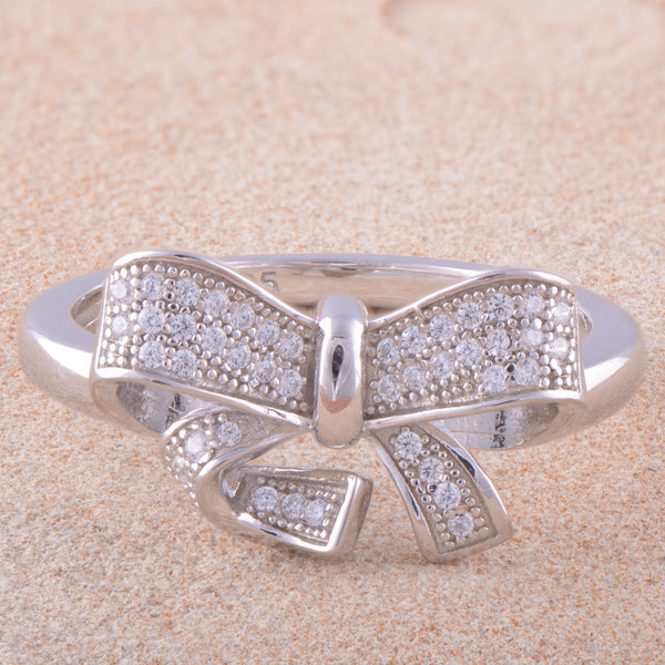 White Gold Over Sterling Silver Womens Cz Gift Bow Ring