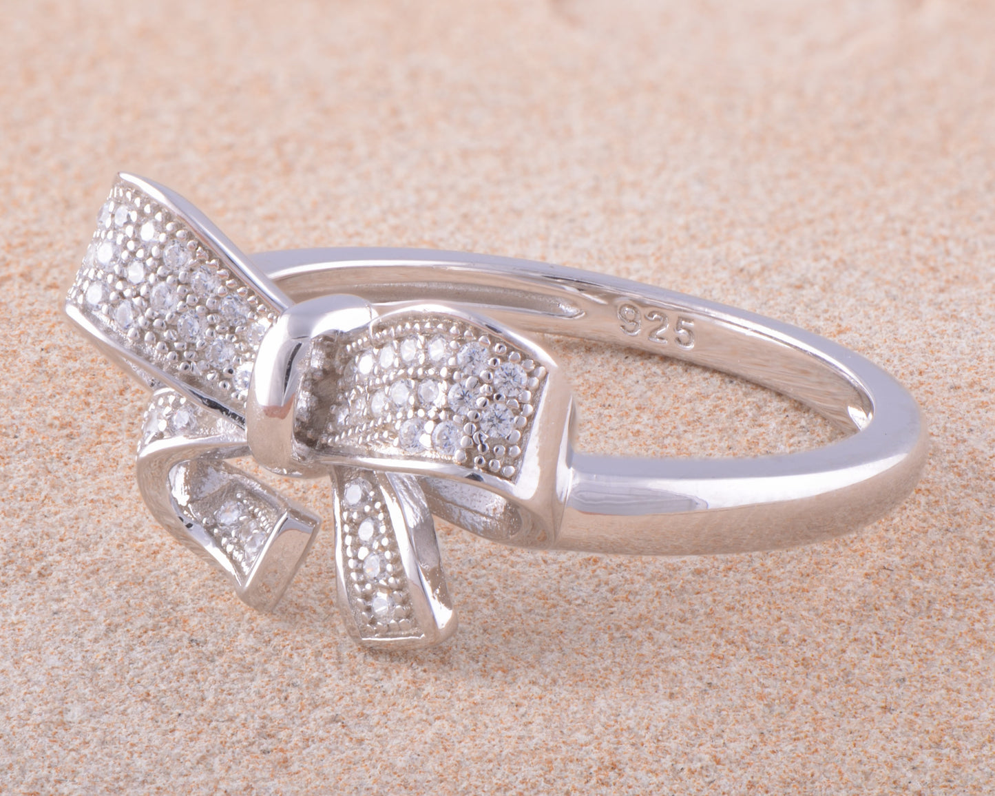 White Gold Over Sterling Silver Womens Cz Gift Bow Ring
