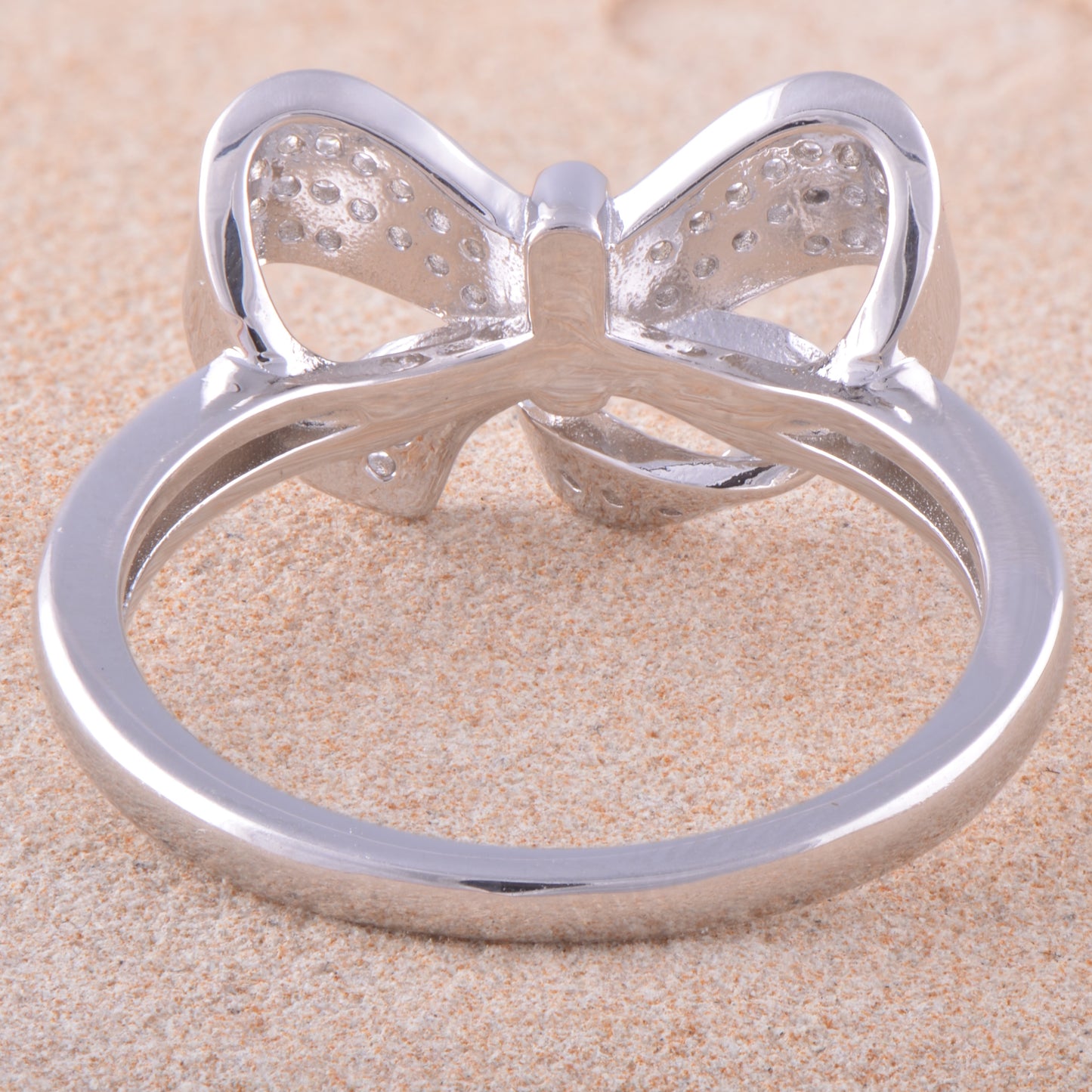 White Gold Over Sterling Silver Womens Cz Gift Bow Ring