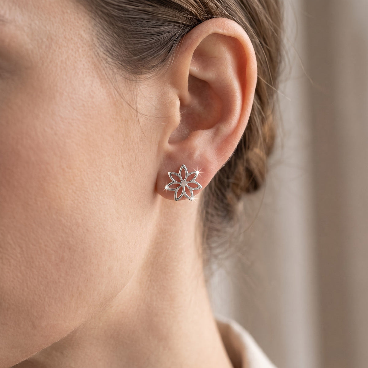 Sterling Silver Celtic Flower Stud Earrings, 8mm worn, lifestyle photo