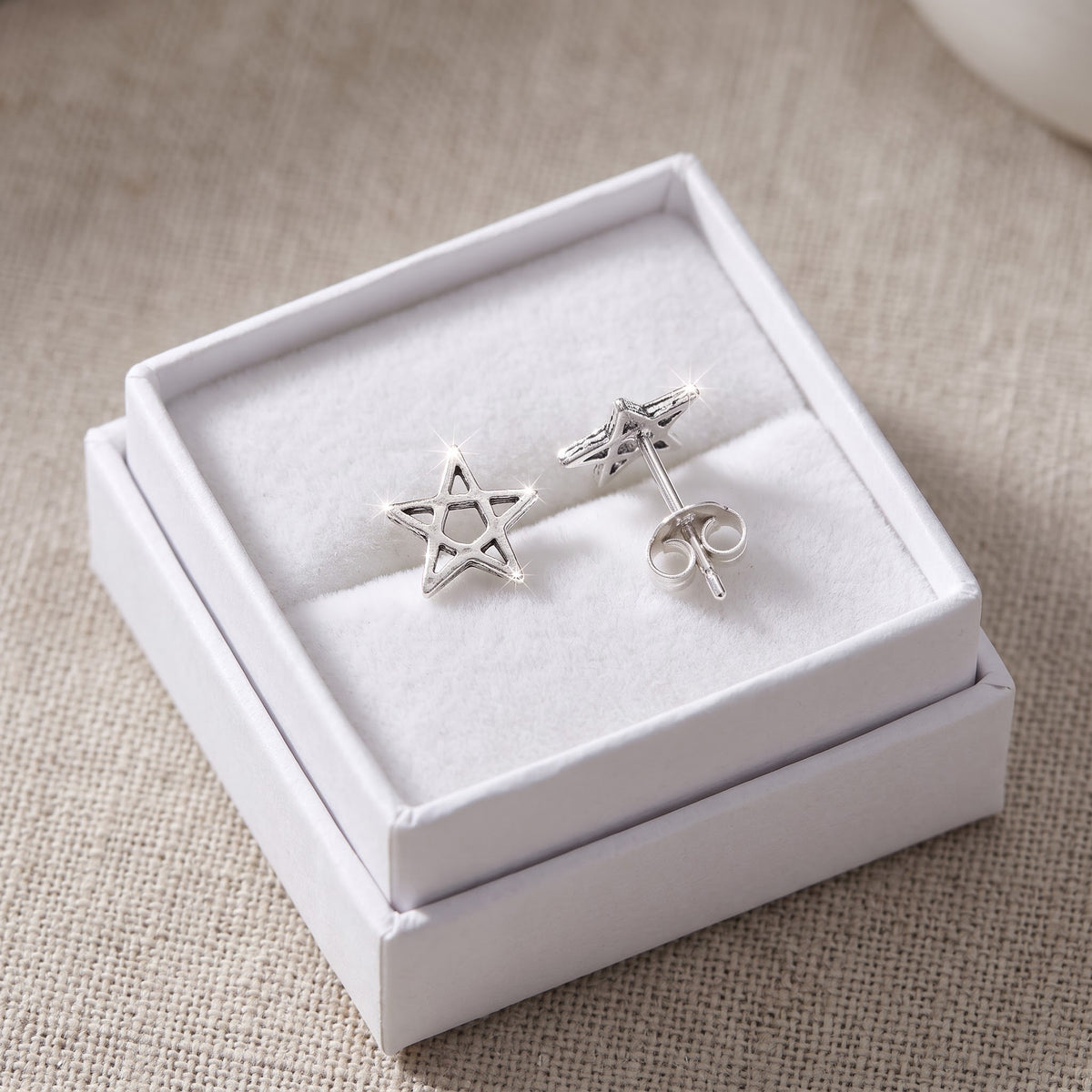 Sterling Silver Pentagram Star Stud Earrings, 7mm in a white gift box, ready to give