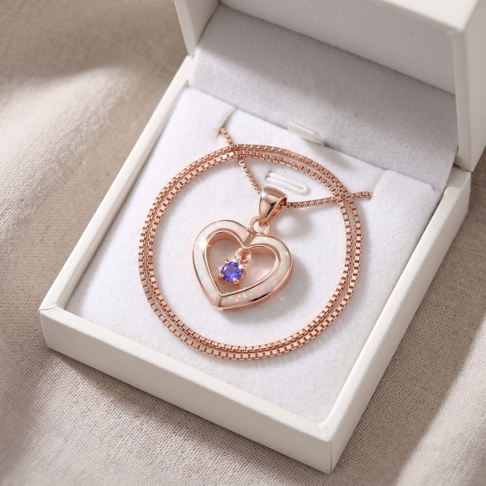 Rose Gold over Sterling Silver Women's Dainty Created Pink Opal Heart Charm Necklace in a white gift box, ready to give