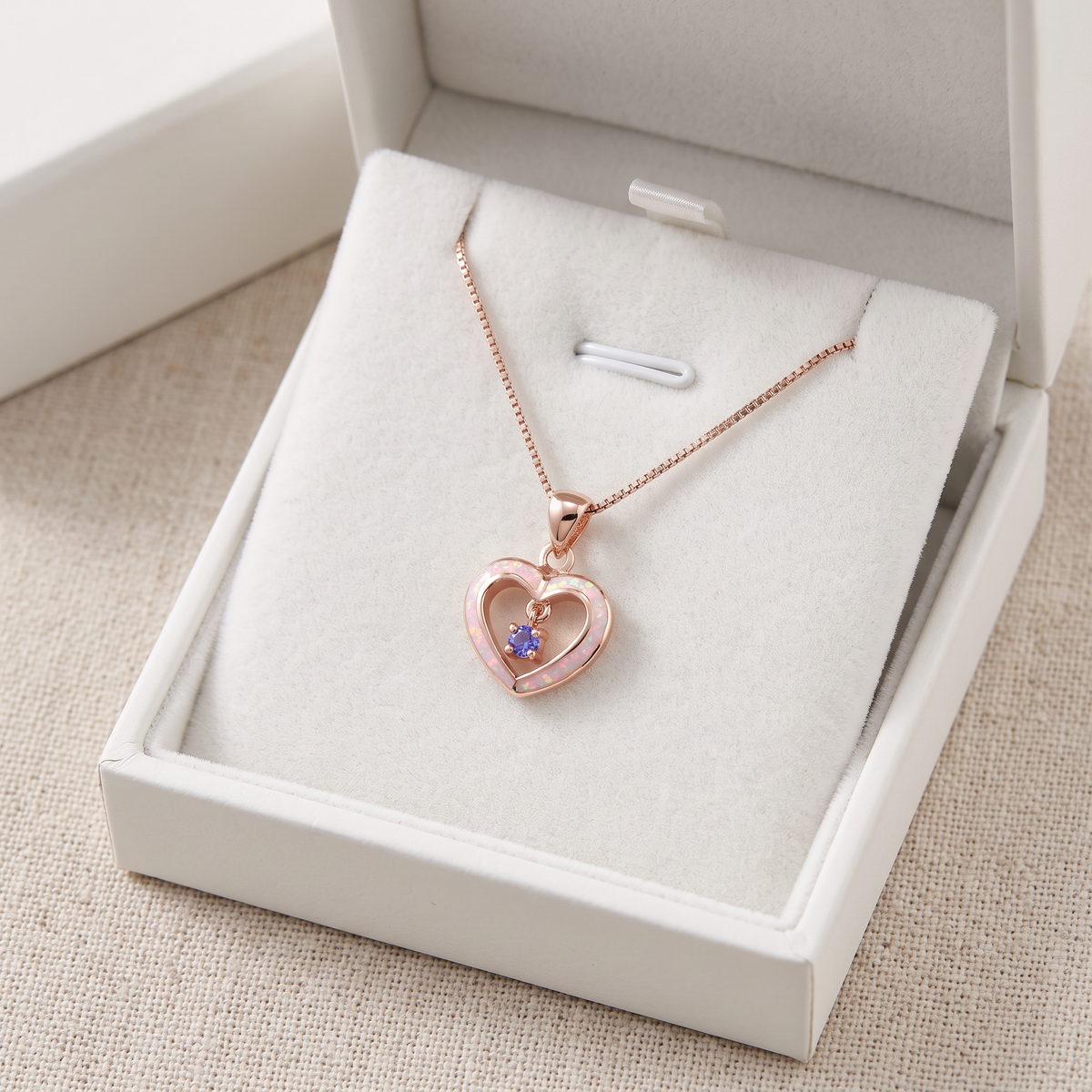 Rose Gold over Sterling Silver Women's Dainty Created Pink Opal Heart Charm Necklace in a white gift box, ready to give