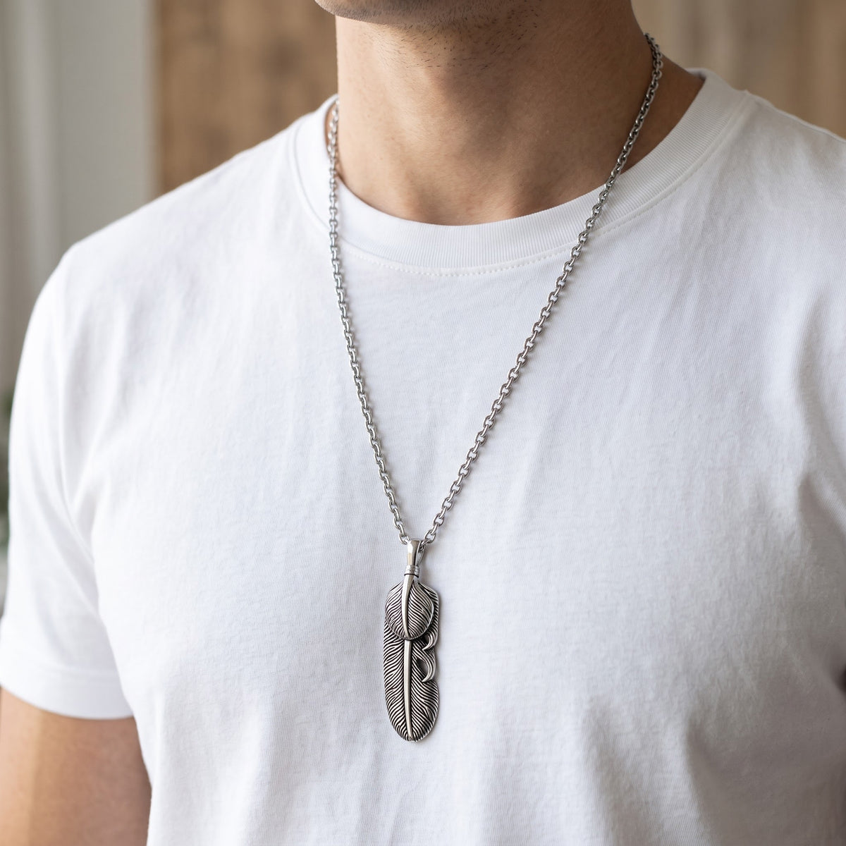 Stainless Steel Women's Feather of Wisdom Charm Necklace - 36 Inch Length, 36" worn, lifestyle photo