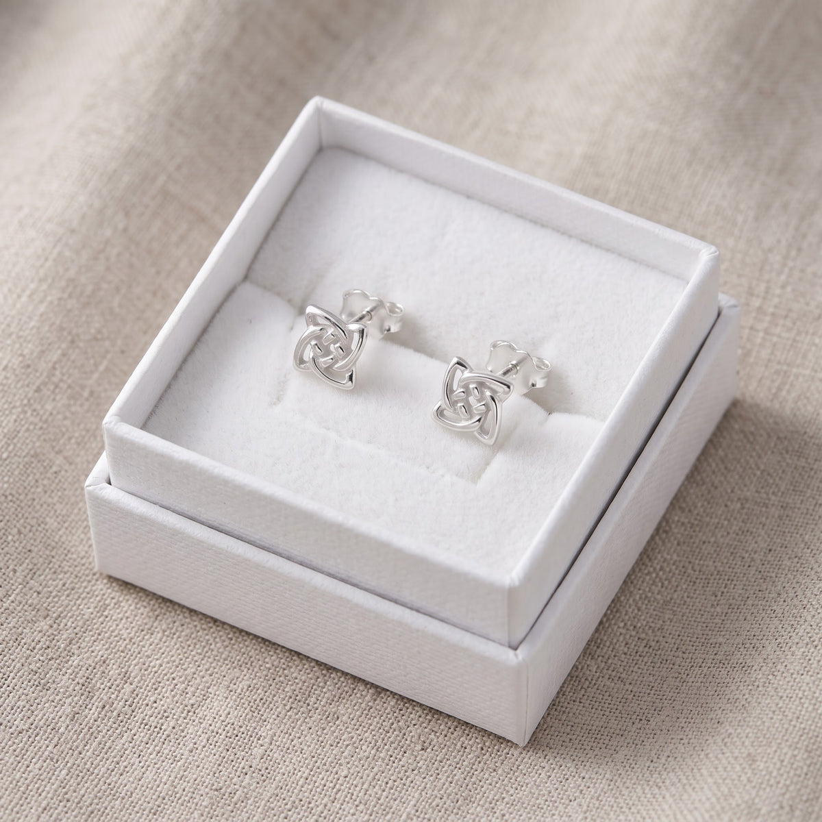 Sterling Silver Celtic Knot Women's Stud Earrings Girls Celtic Triquetra Studs in a white gift box, ready to give