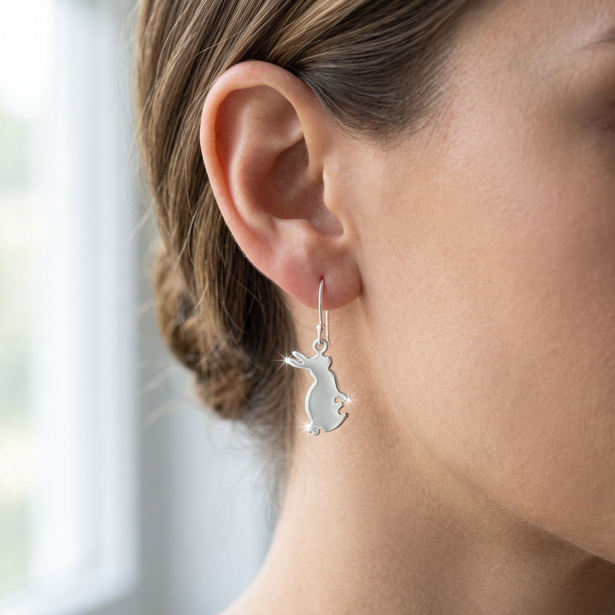 Sterling Silver Dangling Bunny Rabbit Fishhook Earrings for Women worn, lifestyle photo