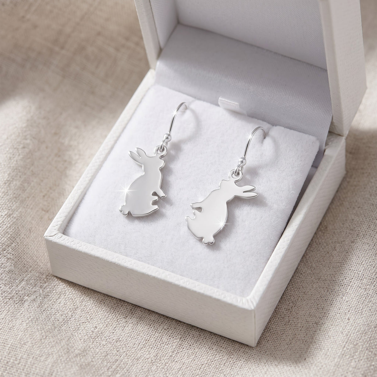 Sterling Silver Dangling Bunny Rabbit Fishhook Earrings for Women in a white gift box, ready to give