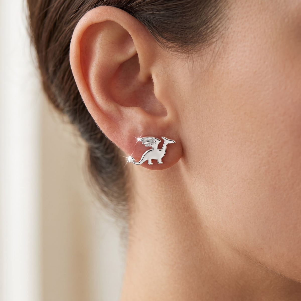 Sterling Silver Magic Dragon Women's Stud Earrings Girls Dragon Studs worn, lifestyle photo