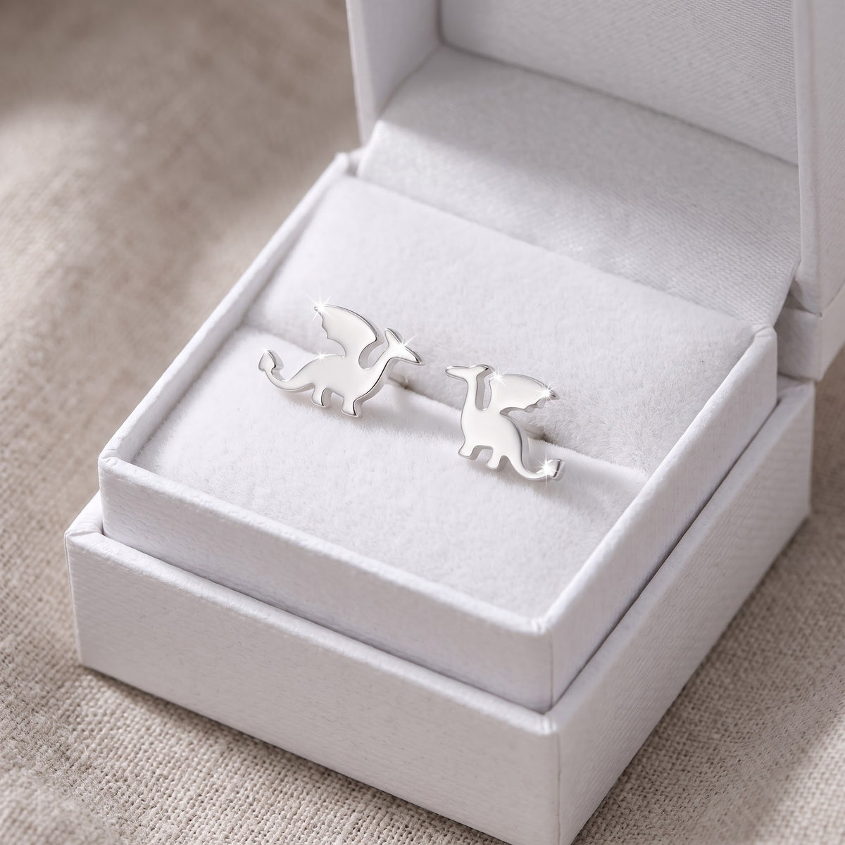 Sterling Silver Magic Dragon Women's Stud Earrings Girls Dragon Studs in a white gift box, ready to give