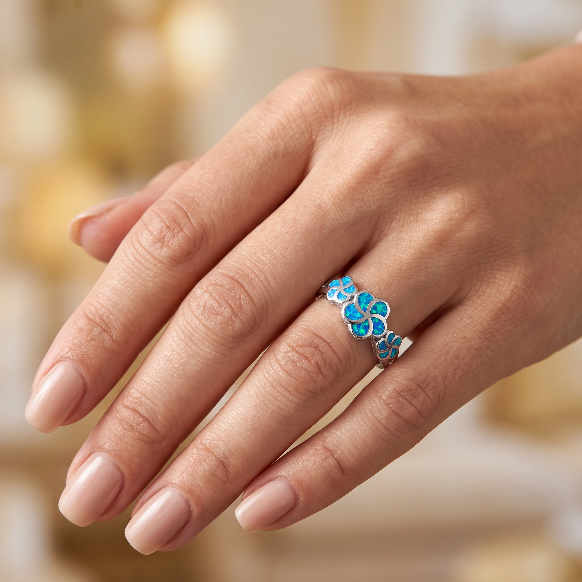 Sterling Silver Lab Opal Plumeria Ring worn on hand