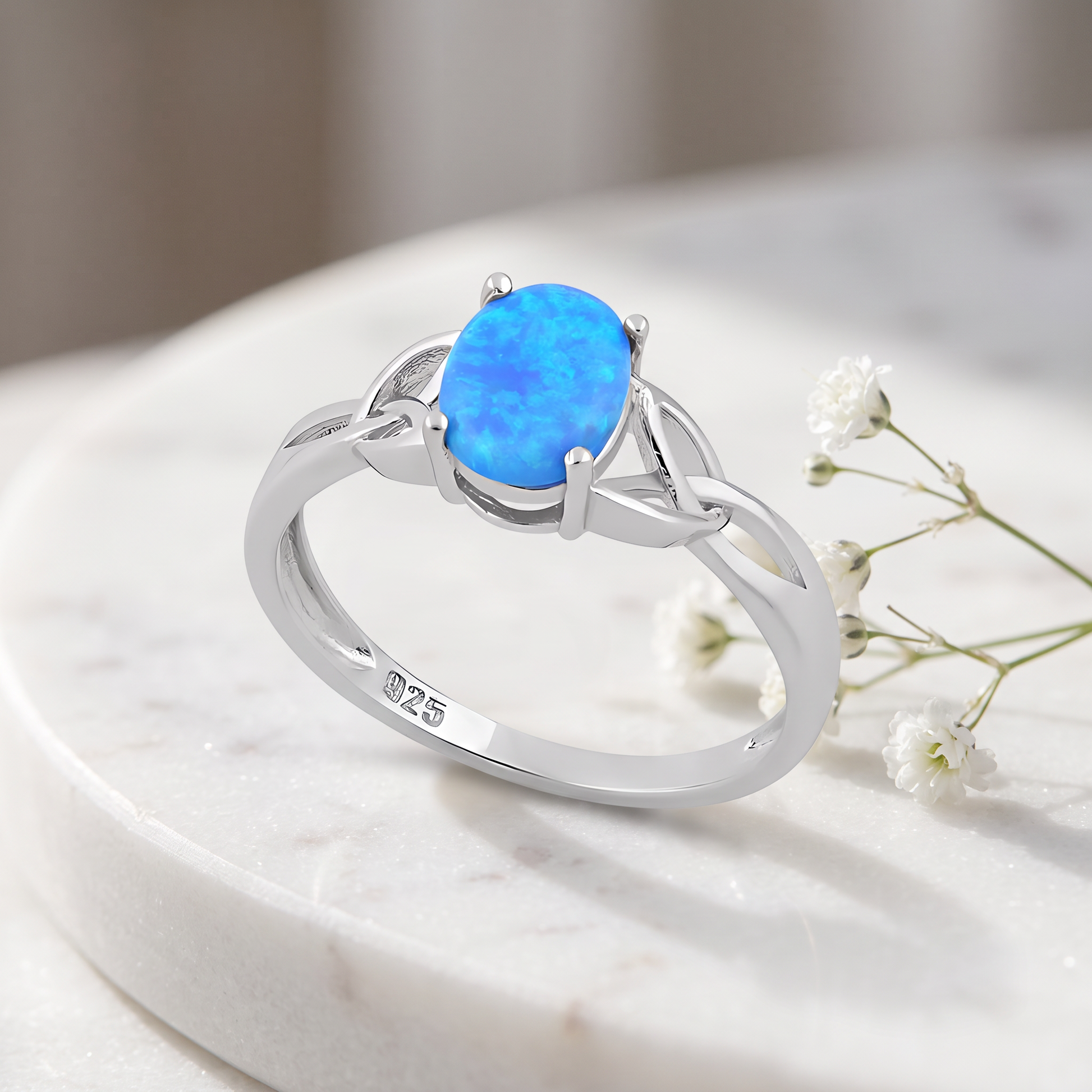 Sterling Silver Center Stone Charmed Blue Lab Opal Ring on marble