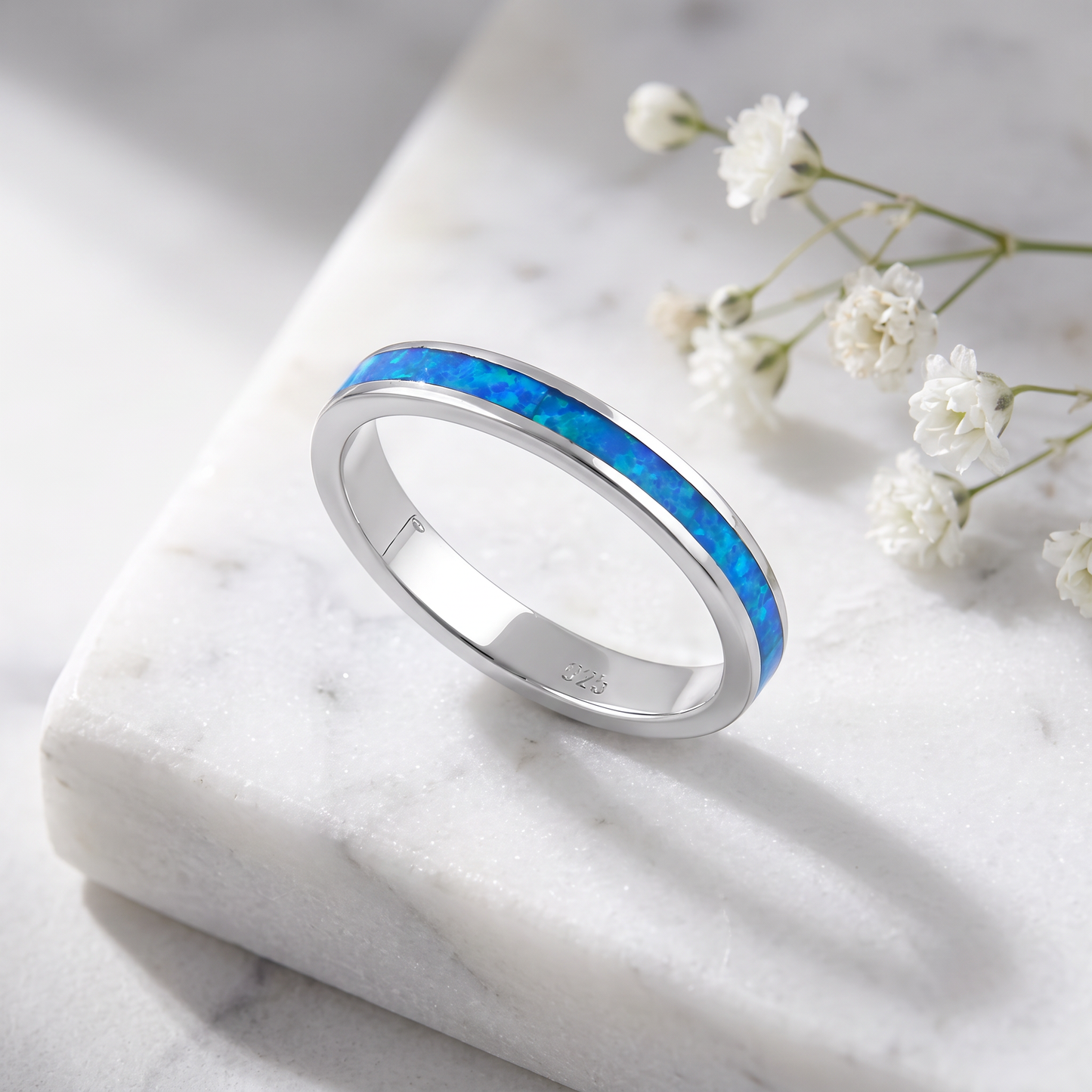 Sterling Silver Seamless Lab Opal Ring on marble