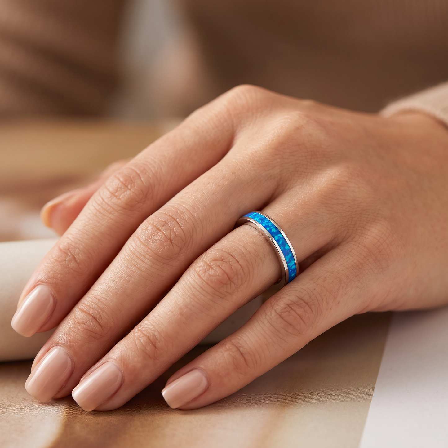 Sterling Silver Seamless Lab Opal Ring worn on hand