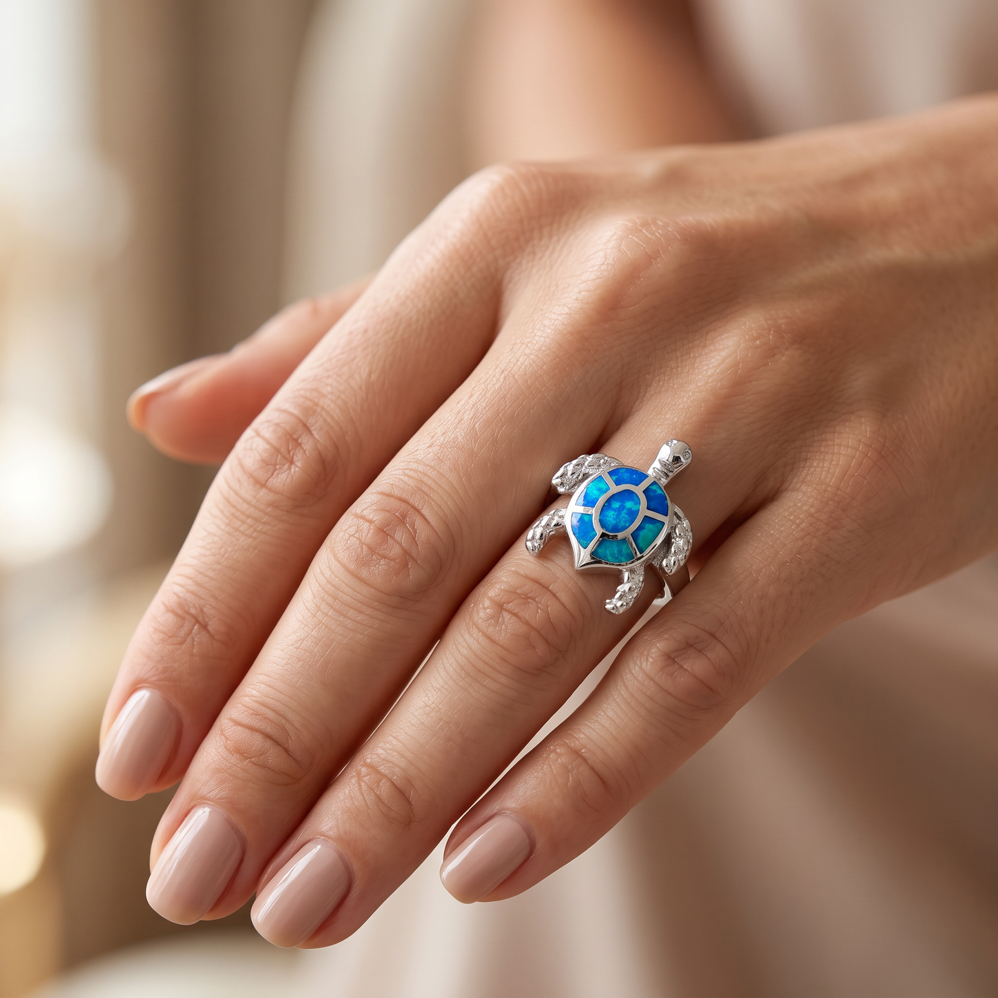 Sterling Silver Turtle Blue Lab Opal Ring worn on hand