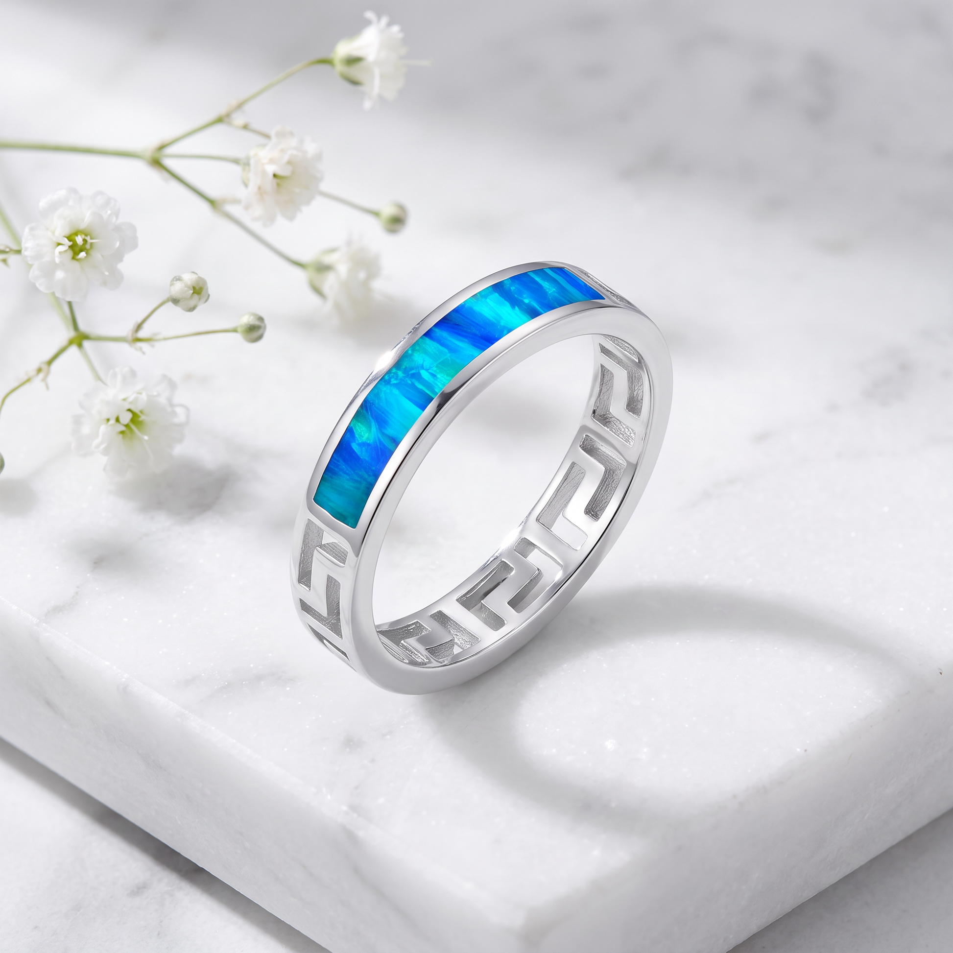 Sterling Silver Greek Blue Lab Opal Band Ring on marble