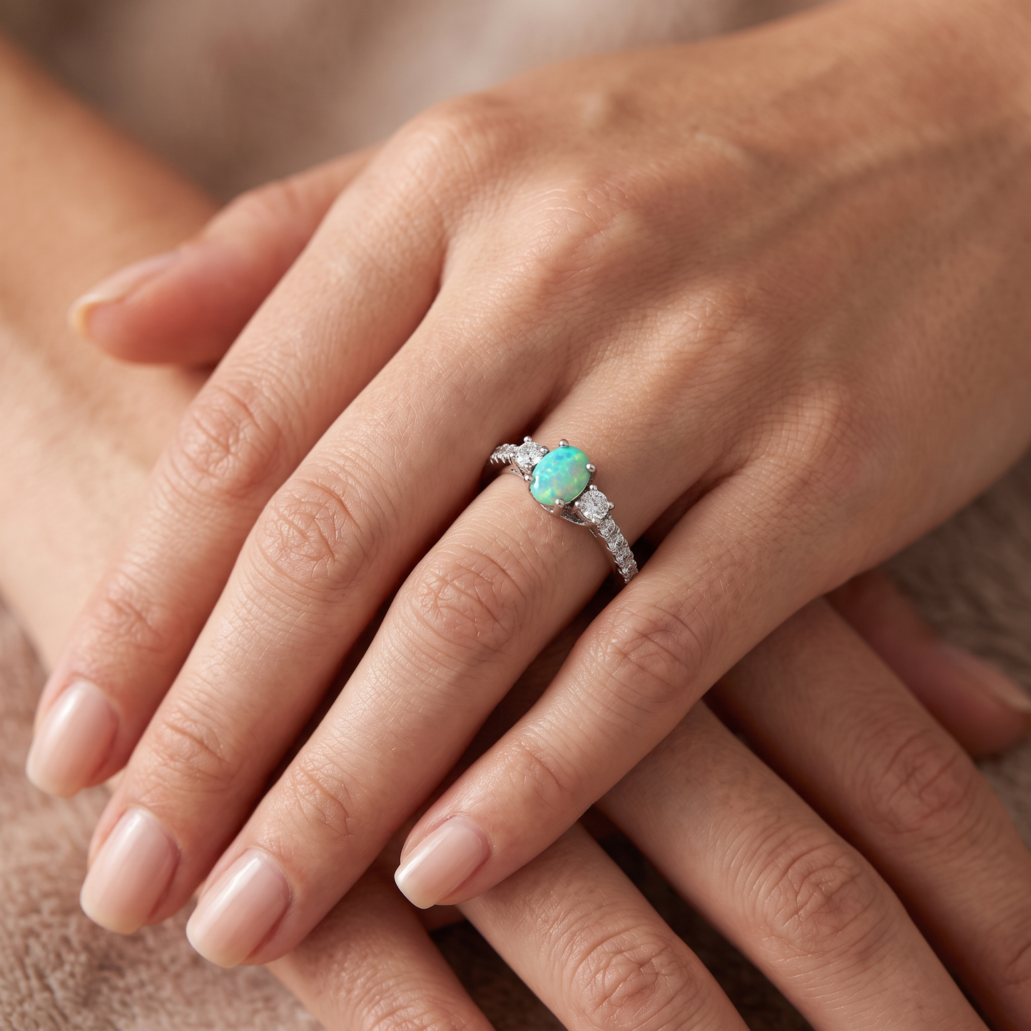 Sterling Silver Enchanted Oval Green Lab Opal CZ Ring worn on hand