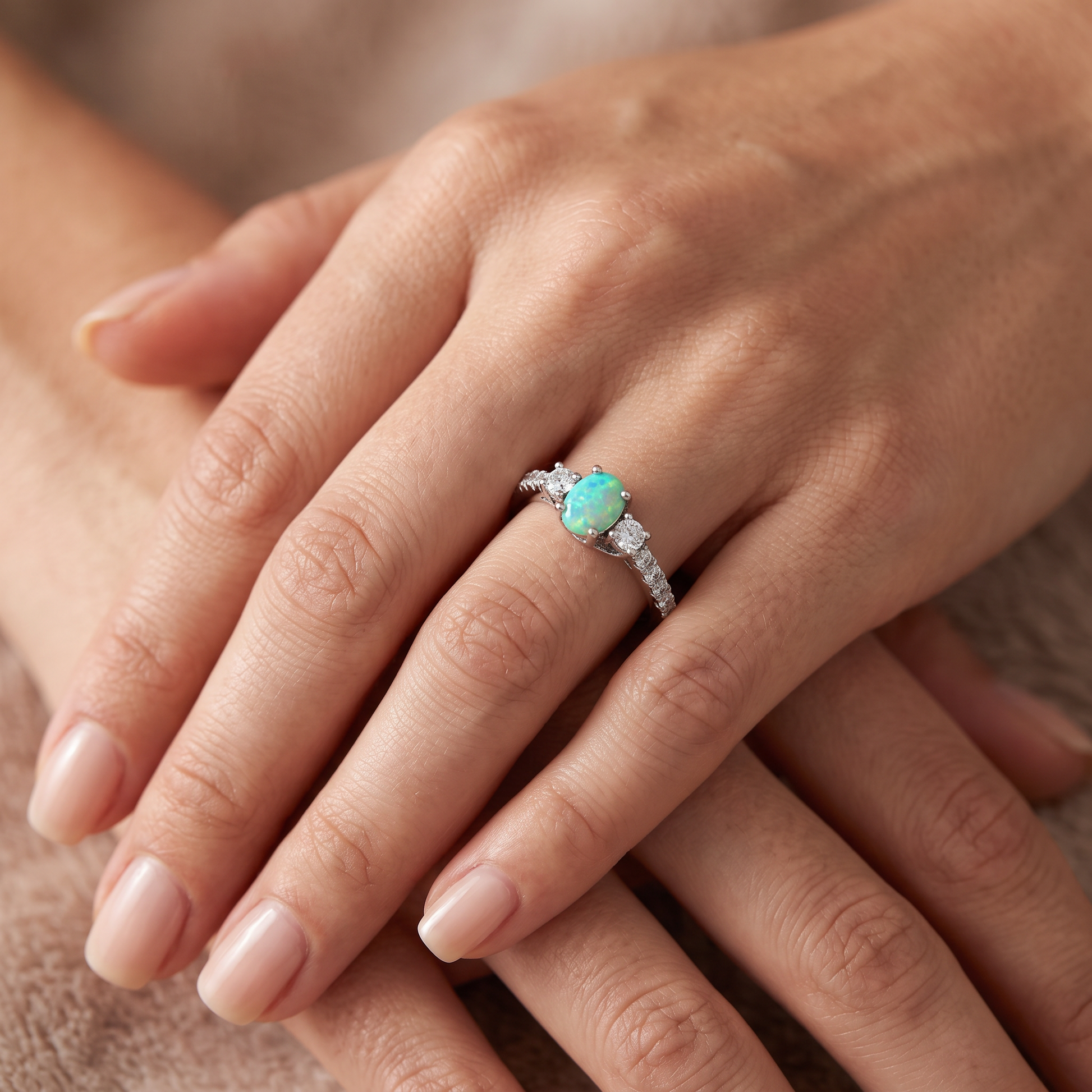 Sterling Silver Enchanted Oval Green Lab Opal CZ Ring worn on hand