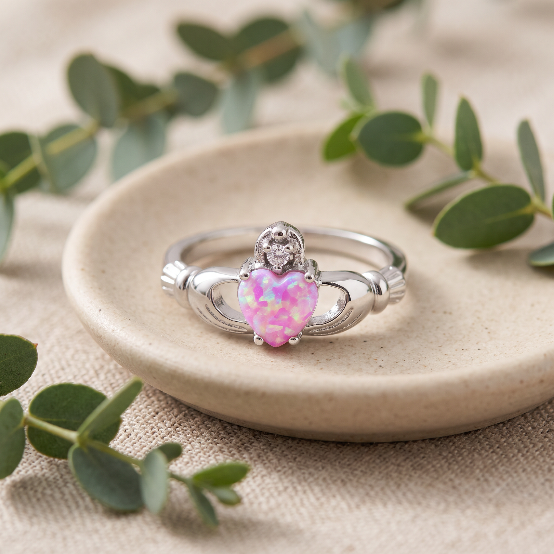 Sterling Silver Claddagh Pink Lab Opal CZ Ring styled