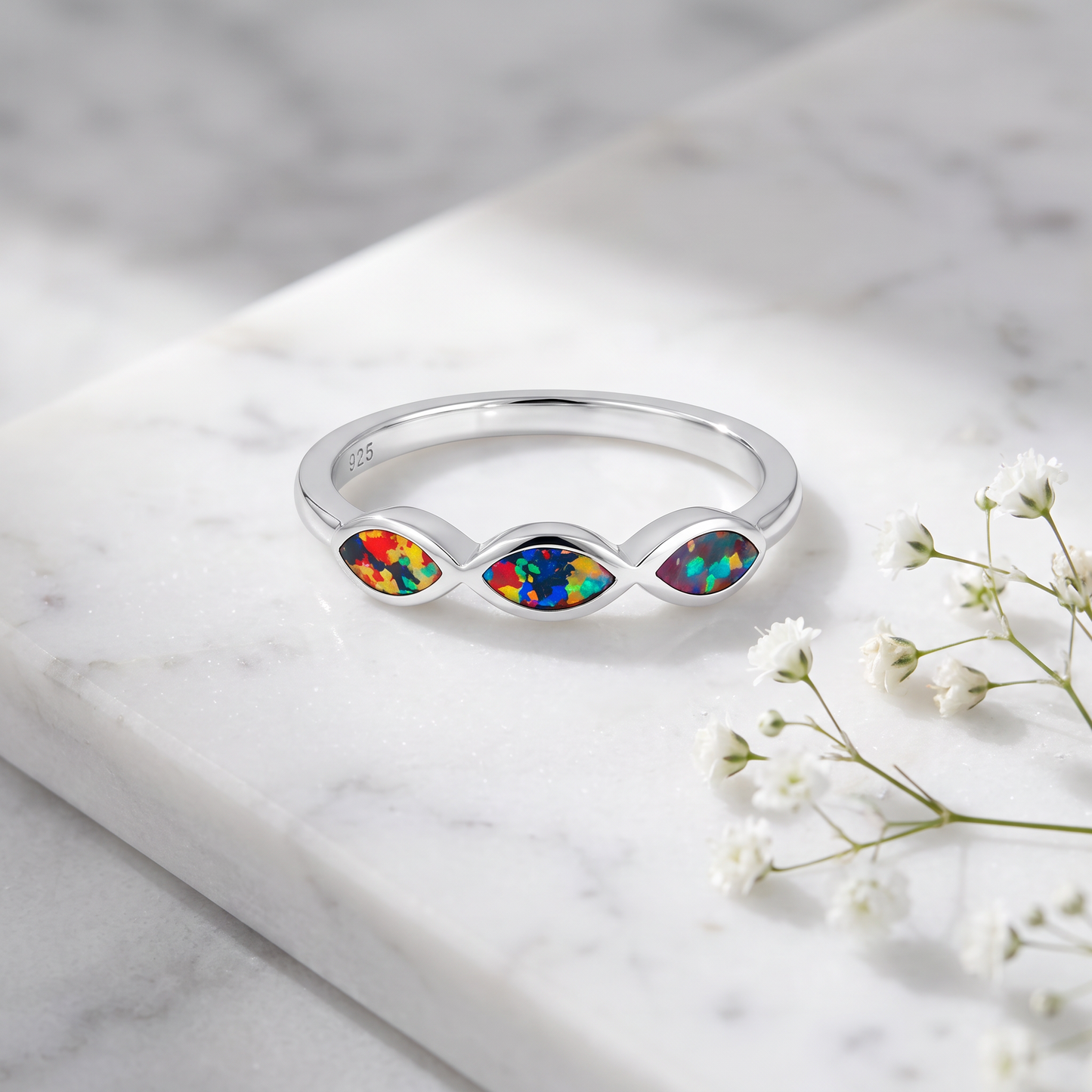 Sterling Silver Triple Marquise Black Lab Opal Ring on marble