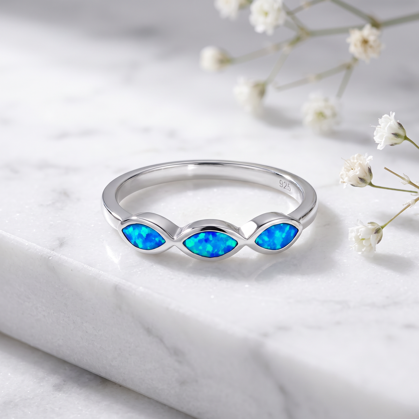 Sterling Silver Triple Marquise Blue Lab Opal Ring on marble